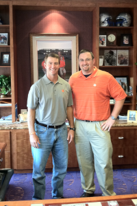 Sealevel's Charlie McKenzie with Clemson University football coach Dabo Swinney