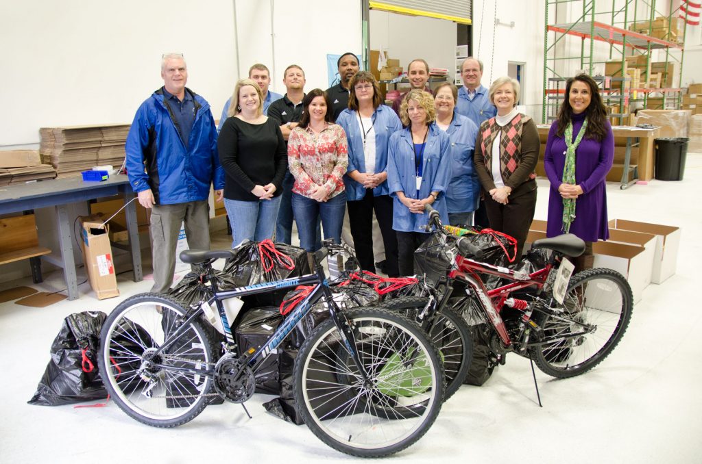 Sealevel donates bikes to Helping Hands